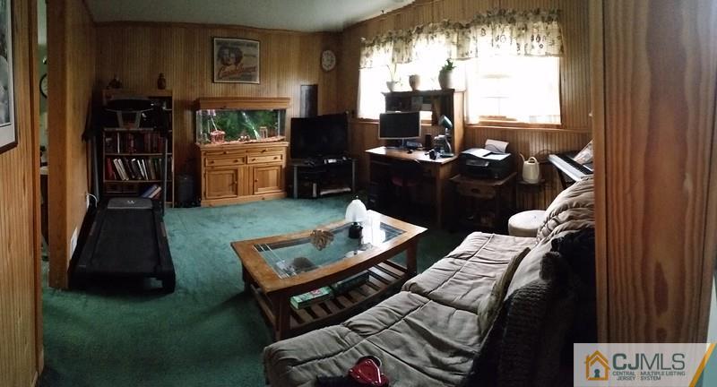 10 Hansen Road Old Bridge, NJ 08857 - Photo 16 of 24 a living room with furniture rug and window