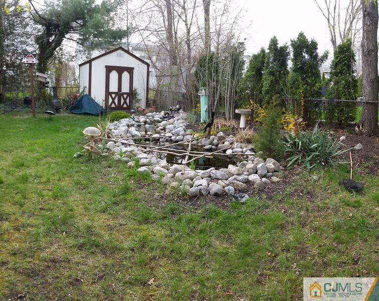 10 Hansen Road Old Bridge, NJ 08857 - Photo 22 of 24 a front view of a house with garden