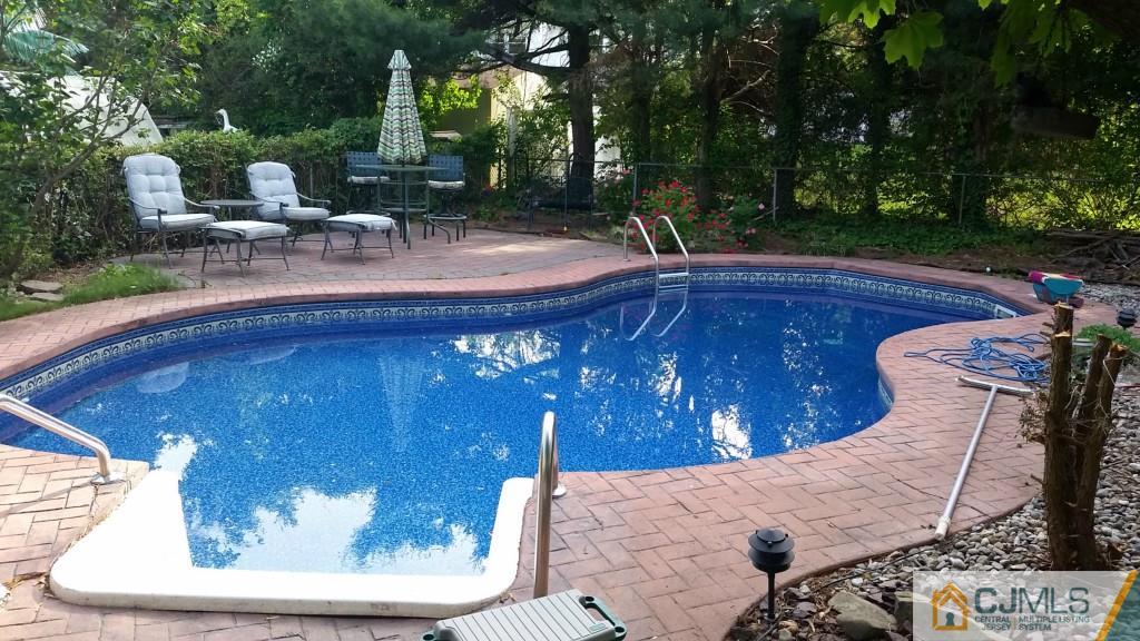 10 Hansen Road Old Bridge, NJ 08857 - Photo 24 of 24 a view of a backyard with sitting area