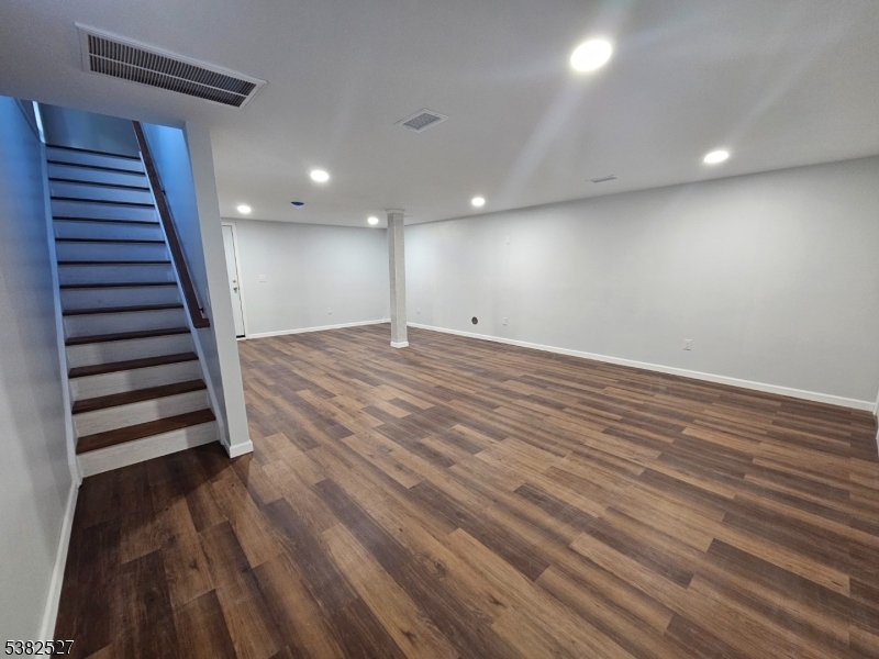 43 Rockport Road Wantage, NJ 07461 - Photo 29 of 30 an empty room with wooden floor