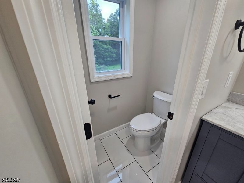 43 Rockport Road Wantage, NJ 07461 - Photo 3 of 30 a white toilet sitting next to a sink