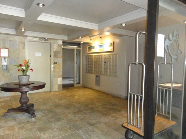 5050 Lawai Road, Unit 101 Koloa, HI 96756 - Photo 19 of 24 a view of a bathroom with a glass door