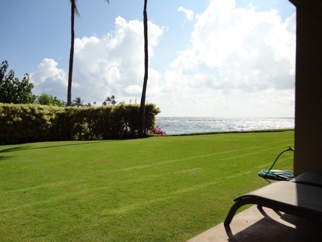 5050 Lawai Road, Unit 101 Koloa, HI 96756 - Photo 2 of 24 a view of a lake with a big yard