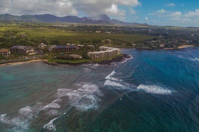 5050 Lawai Road, Unit 101 Koloa, HI 96756 - Photo 6 of 24 a view of an ocean and a mountain