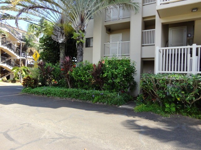 5050 Lawai Road, Unit 101 Koloa, HI 96756 - Photo 9 of 24 a view of a entrance gate of the house