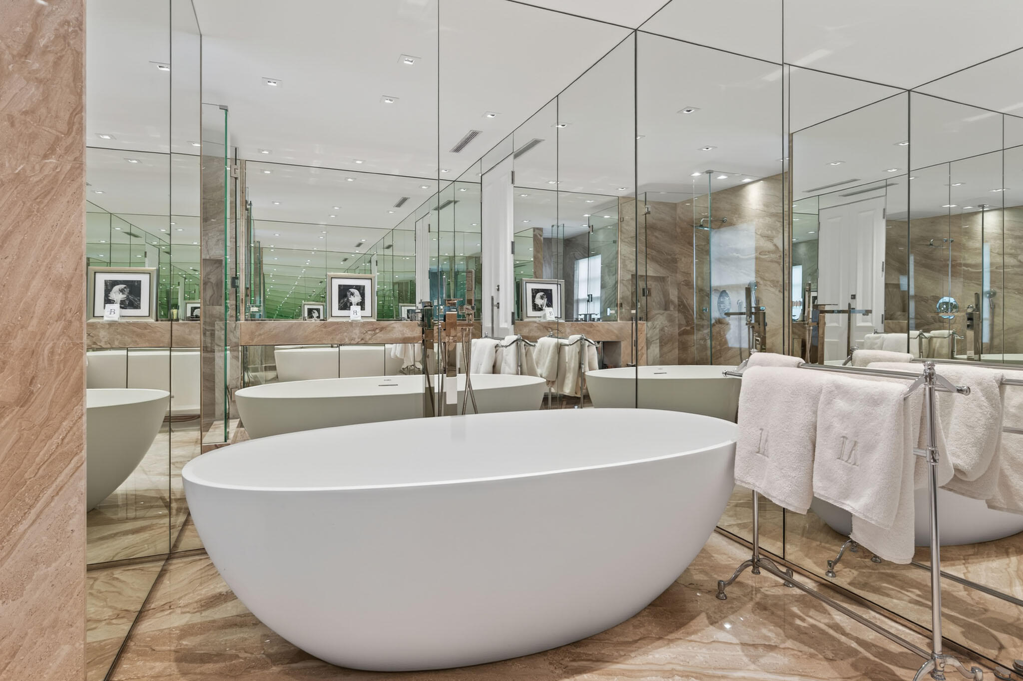 142 South County Road Palm Beach, FL 33480 - Photo 22 of 31 a view of a bathtub in a room