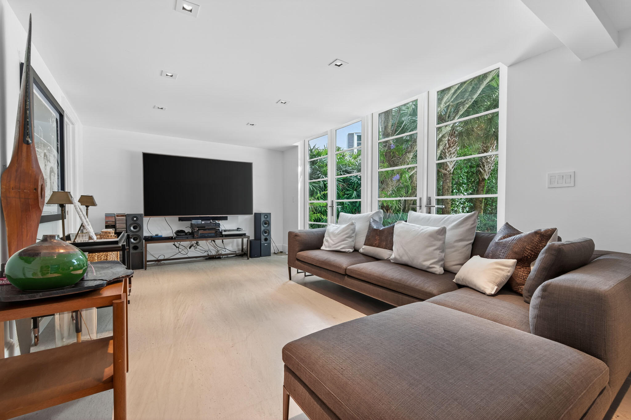 142 South County Road Palm Beach, FL 33480 - Photo 26 of 31 a living room with furniture and a flat screen tv