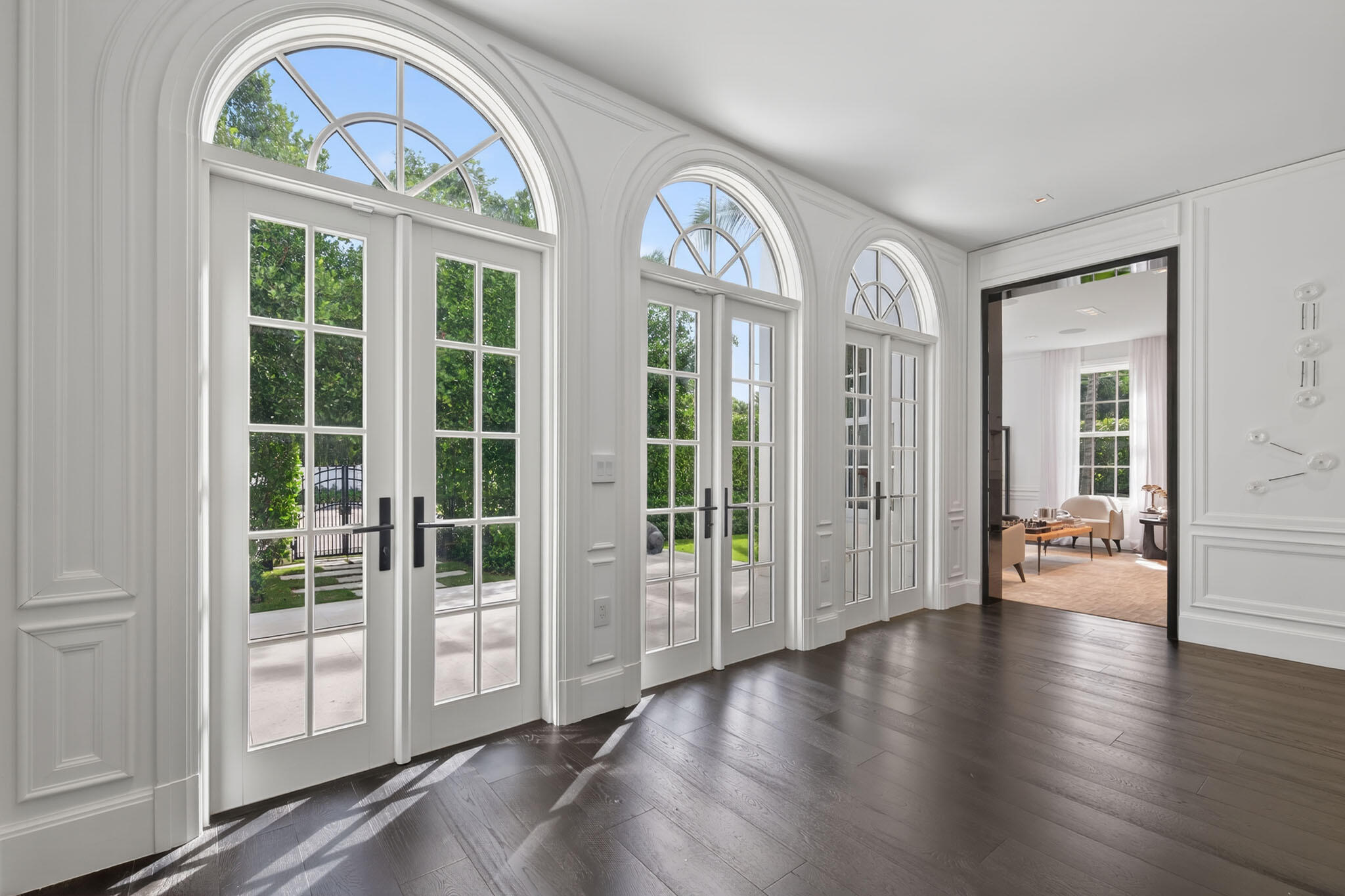 142 South County Road Palm Beach, FL 33480 - Photo 3 of 31 a view of an entryway with wooden floor