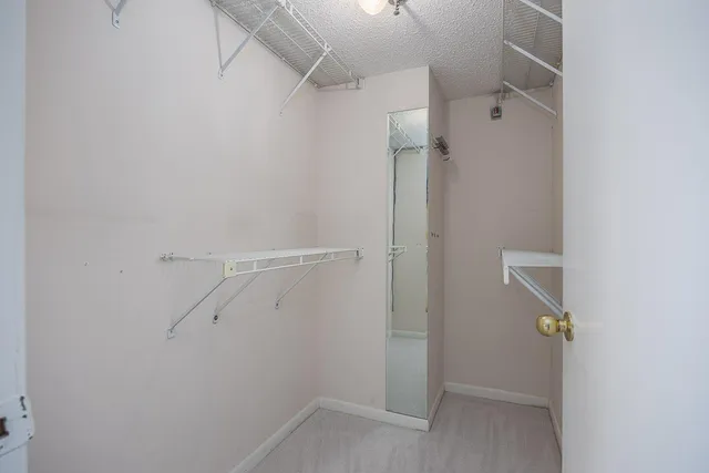 a view of a house with backyard porch and sitting area