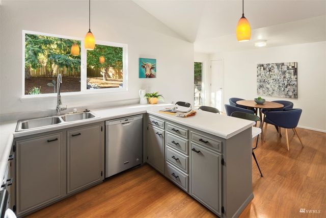 a view of cabinets and kitchen island