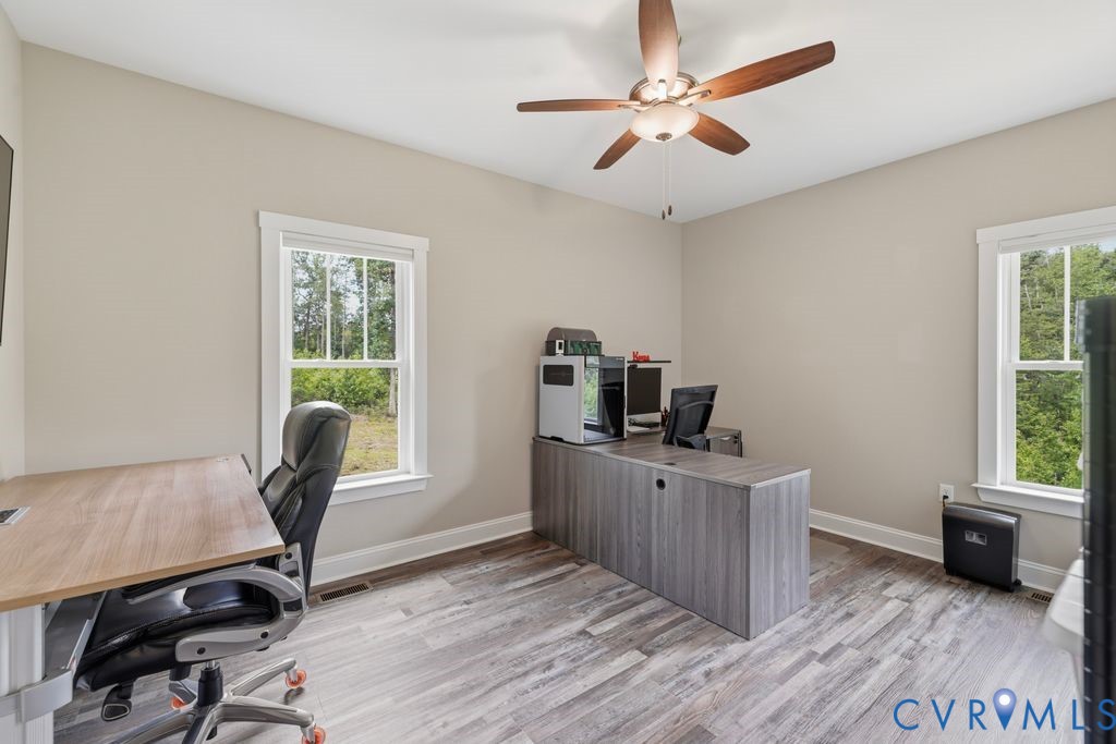 3259 Three Bridge Road Powhatan, VA 23139 - Photo 26 of 43 Neutral painted walls with white trim, wood-finish