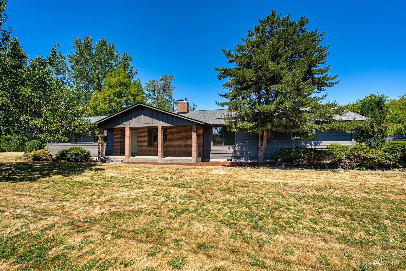 1861 Bishop Road Chehalis, WA 98532 - Photo 1 of 38 a front view of a house with a yard