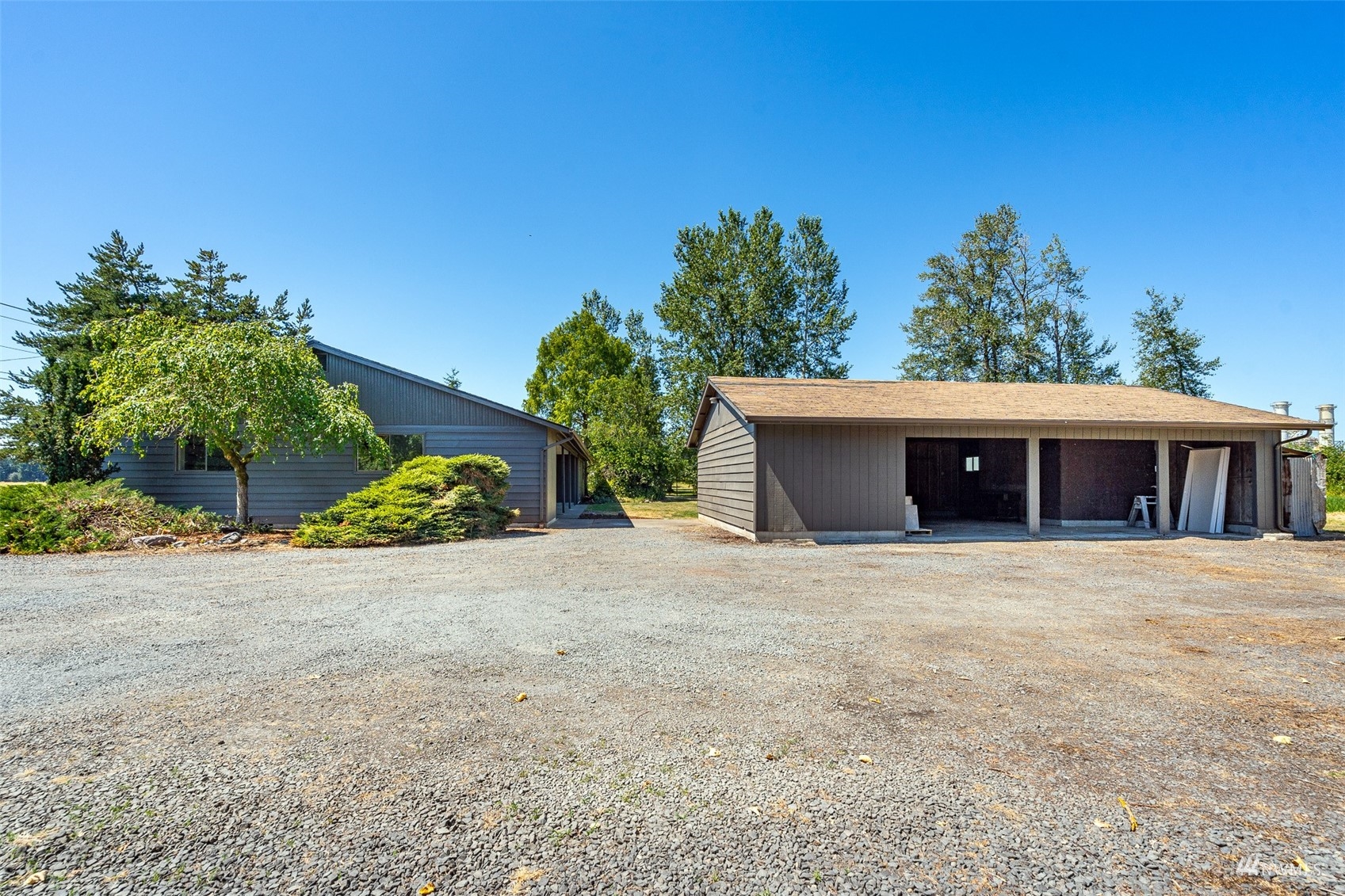 1861 Bishop Road Chehalis, WA 98532 - Photo 25 of 38 a front view of a house with a yard and garage