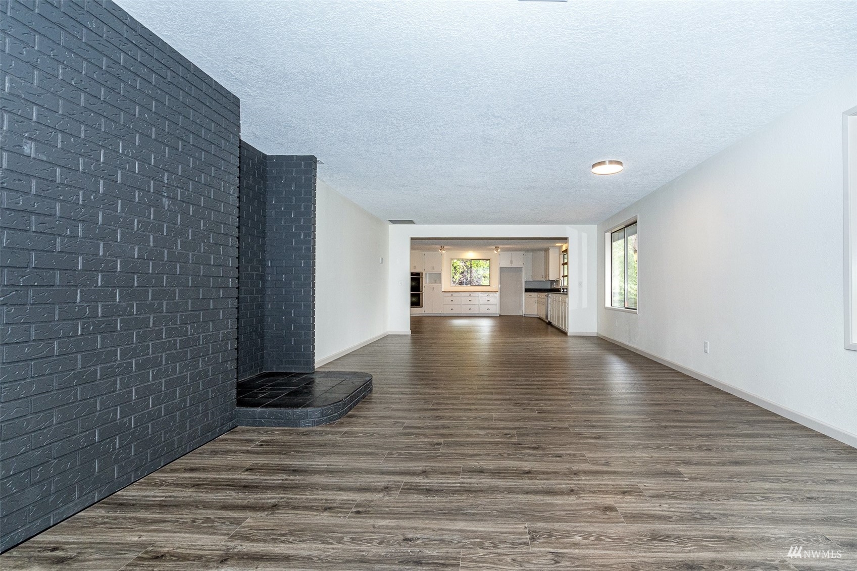 1861 Bishop Road Chehalis, WA 98532 - Photo 6 of 38 a view of empty room with wooden floor and fan