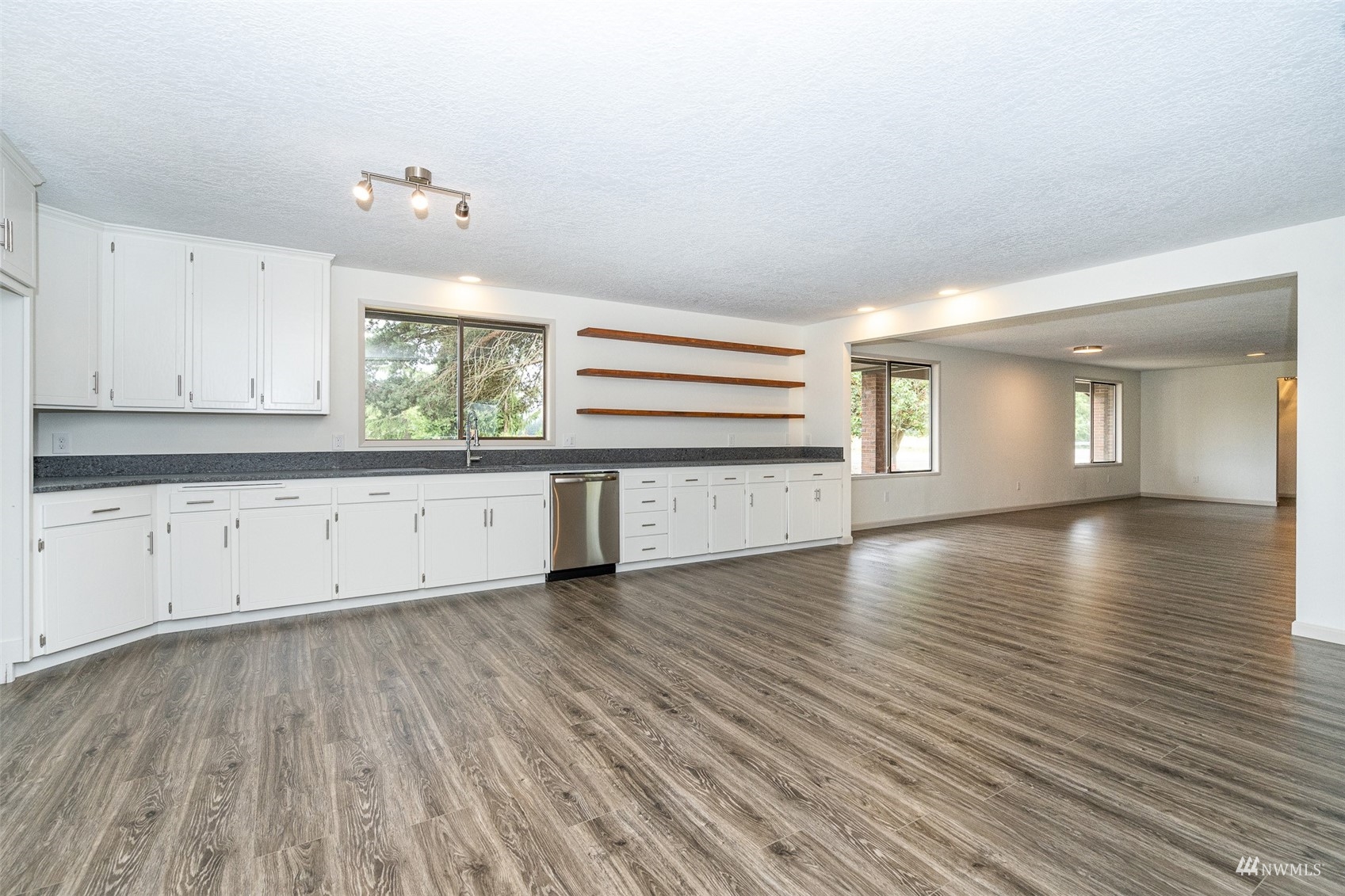1861 Bishop Road Chehalis, WA 98532 - Photo 9 of 38 a view of a kitchen with wooden floor and a window