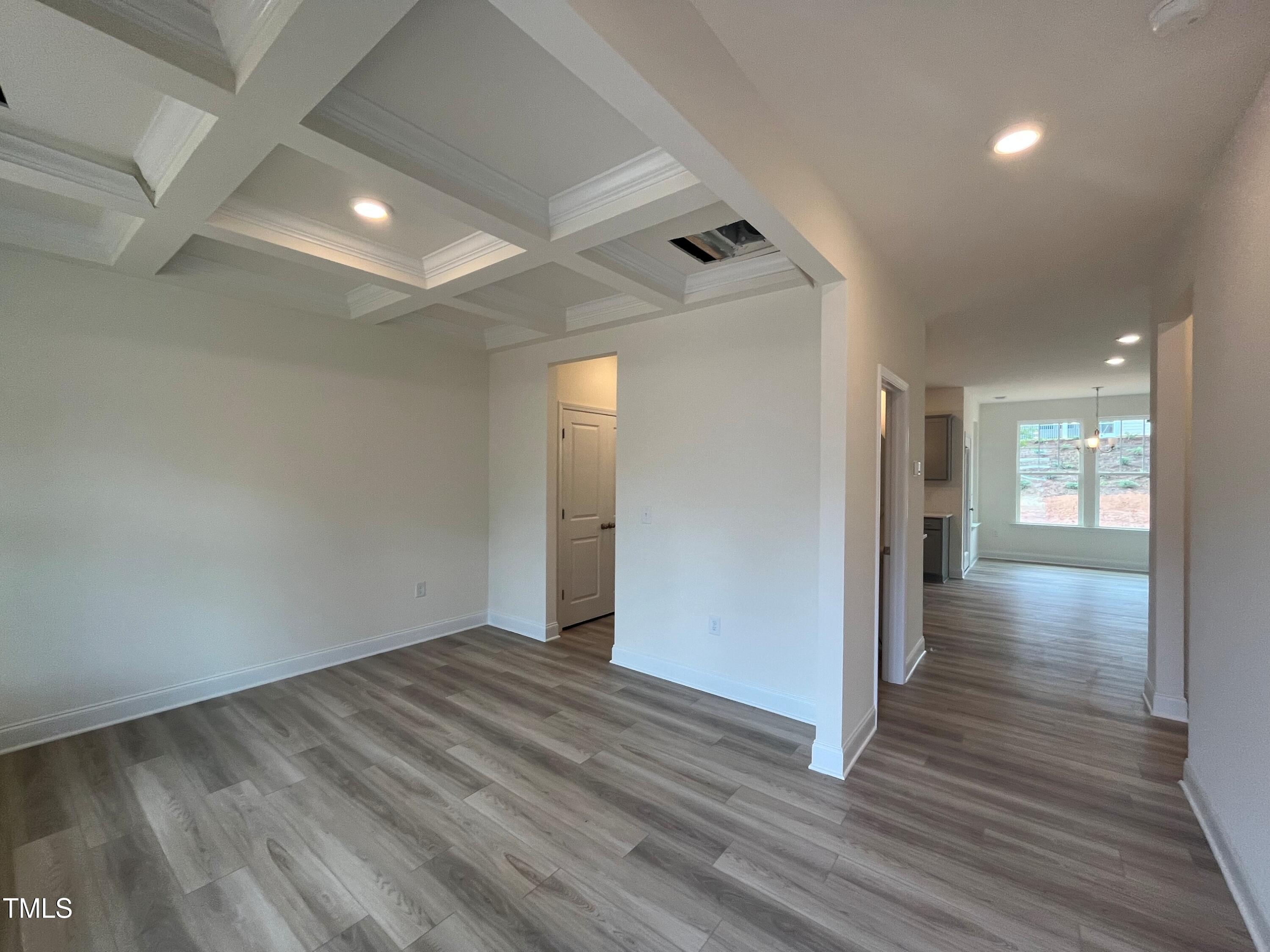 779 Old Station Pointe Angier, NC 27501 - Photo 4 of 33 a view of an empty room with wooden floor