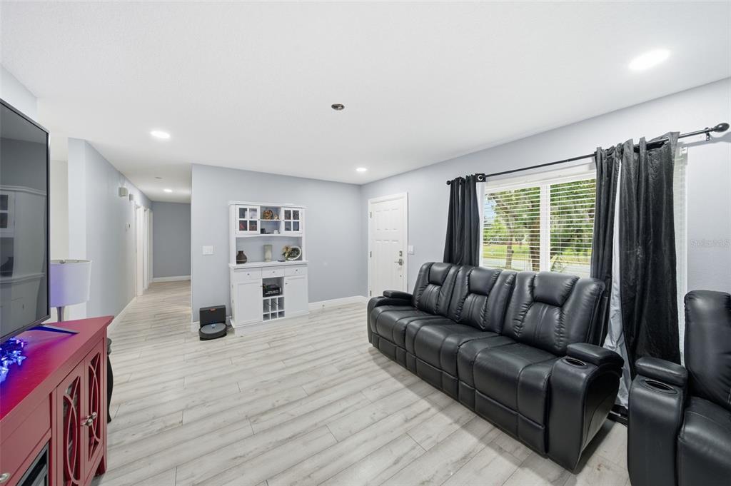 1113 Oakhill Street Seffner, FL 33584 - Photo 13 of 44 a living room with furniture and a large window