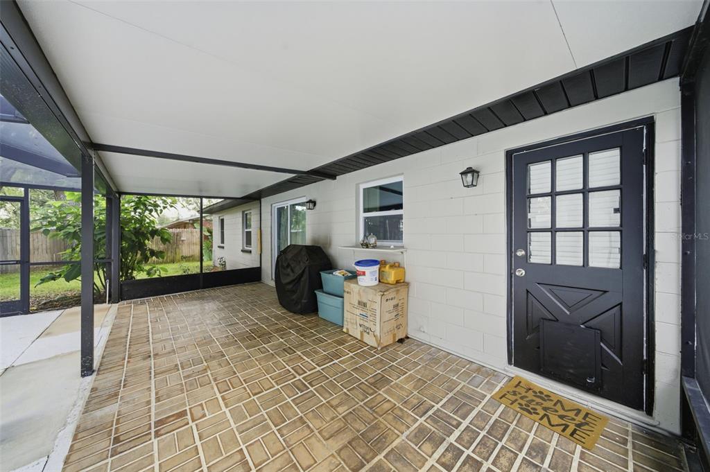 1113 Oakhill Street Seffner, FL 33584 - Photo 28 of 44 a view of a porch with a tv