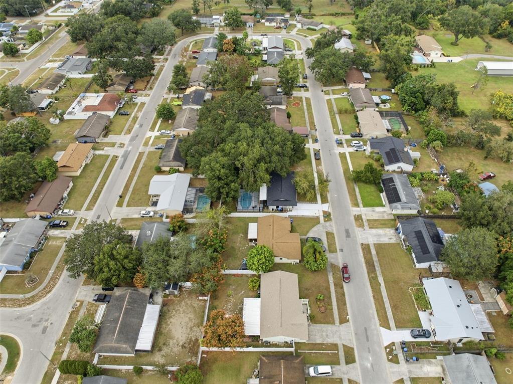 1113 Oakhill Street Seffner, FL 33584 - Photo 42 of 44 an aerial view of residential houses with outdoor space