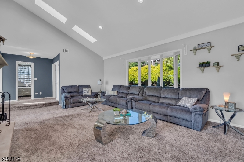 11 Bass Rock Road Hopatcong, NJ 07843 - Photo 11 of 50 a living room with furniture and a large window