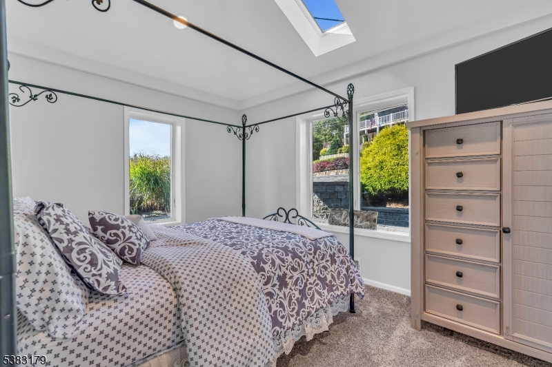 11 Bass Rock Road Hopatcong, NJ 07843 - Photo 23 of 50 a bedroom with a bed and a window