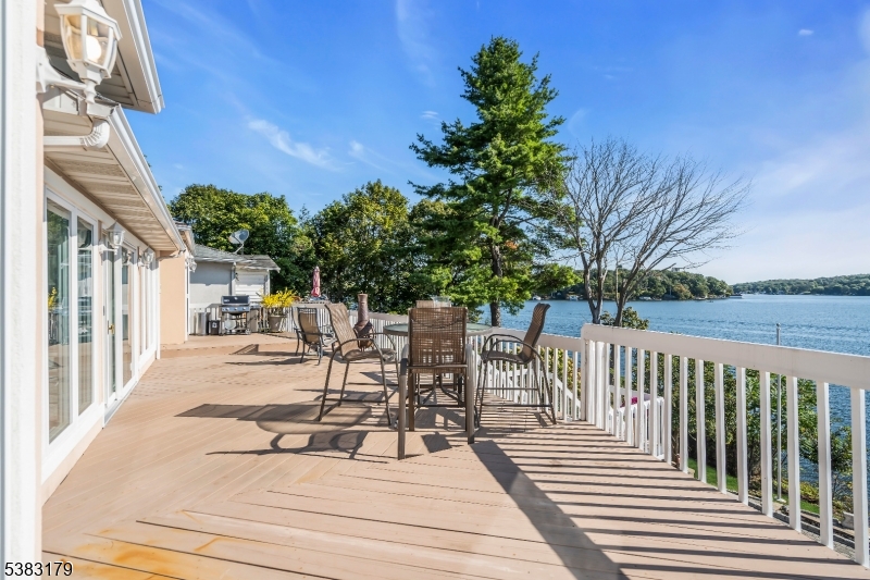 11 Bass Rock Road Hopatcong, NJ 07843 - Photo 29 of 50 a view of balcony with wooden floor and outdoor seating