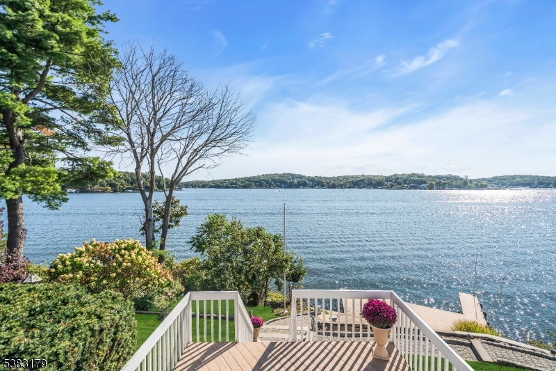 11 Bass Rock Road Hopatcong, NJ 07843 - Photo 34 of 50 a view of a balcony with wooden floor and lake view