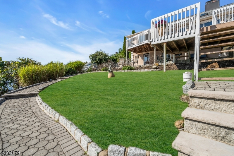 11 Bass Rock Road Hopatcong, NJ 07843 - Photo 37 of 50 a view of a house with a yard balcony and sitting area