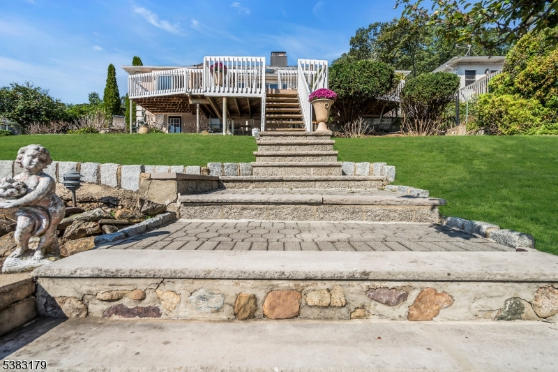 11 Bass Rock Road Hopatcong, NJ 07843 - Photo 41 of 50 front view of a house with a yard