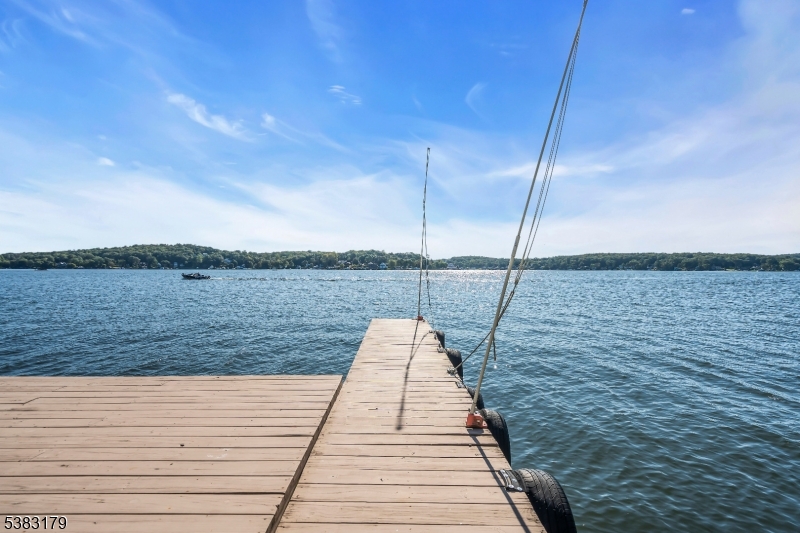 11 Bass Rock Road Hopatcong, NJ 07843 - Photo 5 of 50 a wooden pier with view of lake