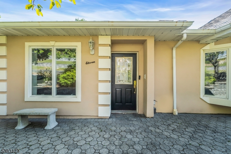 11 Bass Rock Road Hopatcong, NJ 07843 - Photo 7 of 50 a front view of a house with a toilet