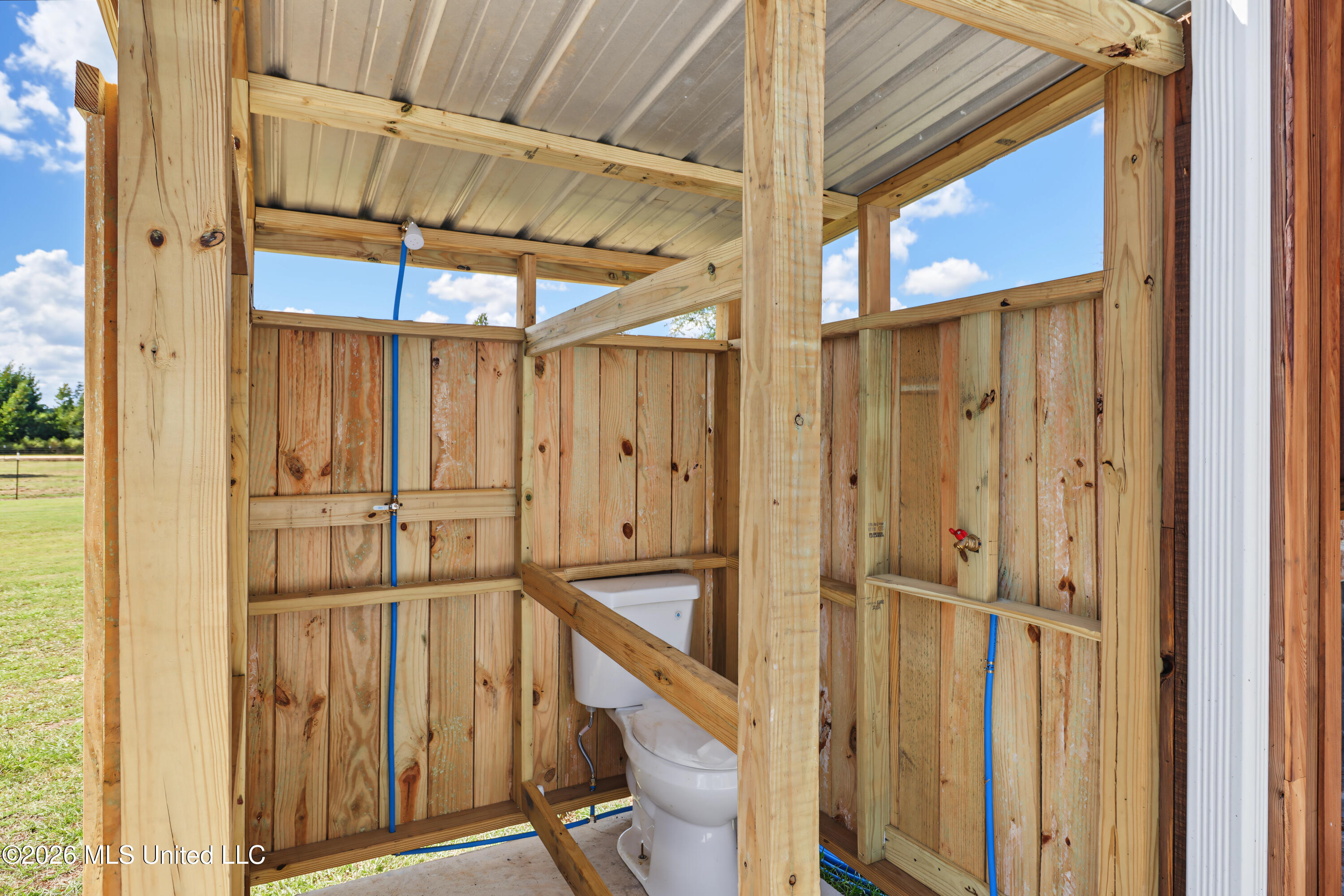 326 West Wire Road Perkinston, MS 39573 - Photo 37 of 42 Outdoor shower/toilet