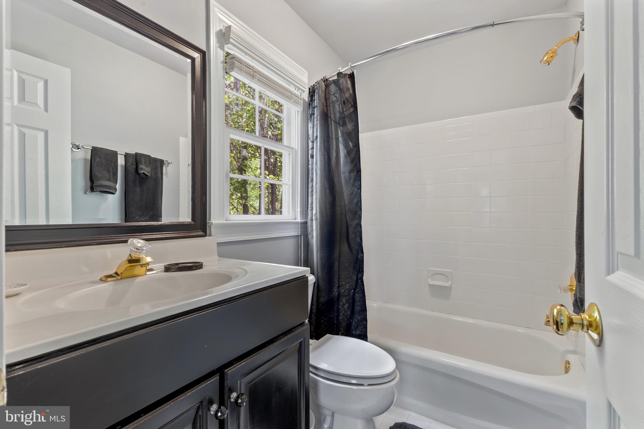 15006 Ransom Oaks Court Gainesville, VA 20155 - Photo 19 of 57 Charming bathroom with modern touches.