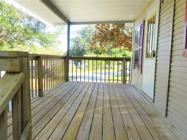 a view of backyard with green space