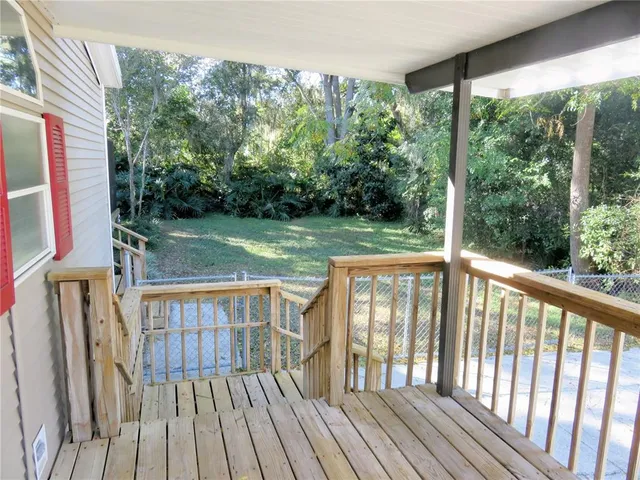 a kitchen with stainless steel appliances a stove a refrigerator and cabinets