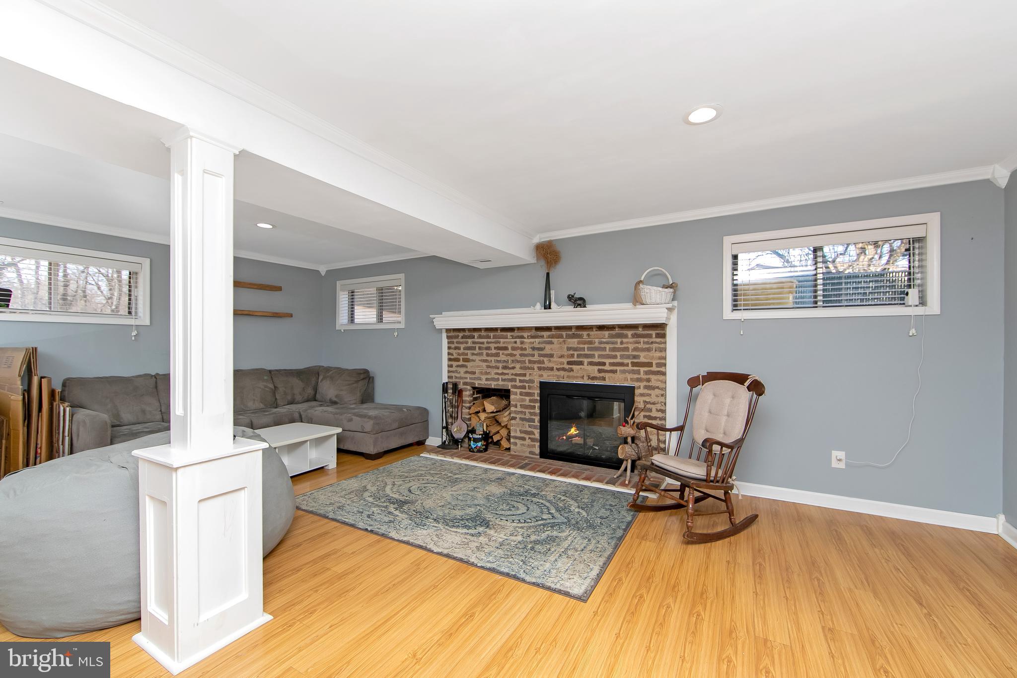 121 Capella Road Sewell, NJ 08080 - Photo 18 of 29 a living room with furniture and a fireplace