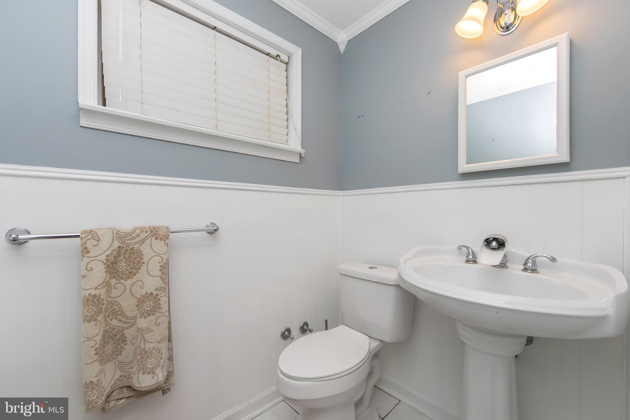 121 Capella Road Sewell, NJ 08080 - Photo 22 of 29 a bathroom with a sink and a toilet