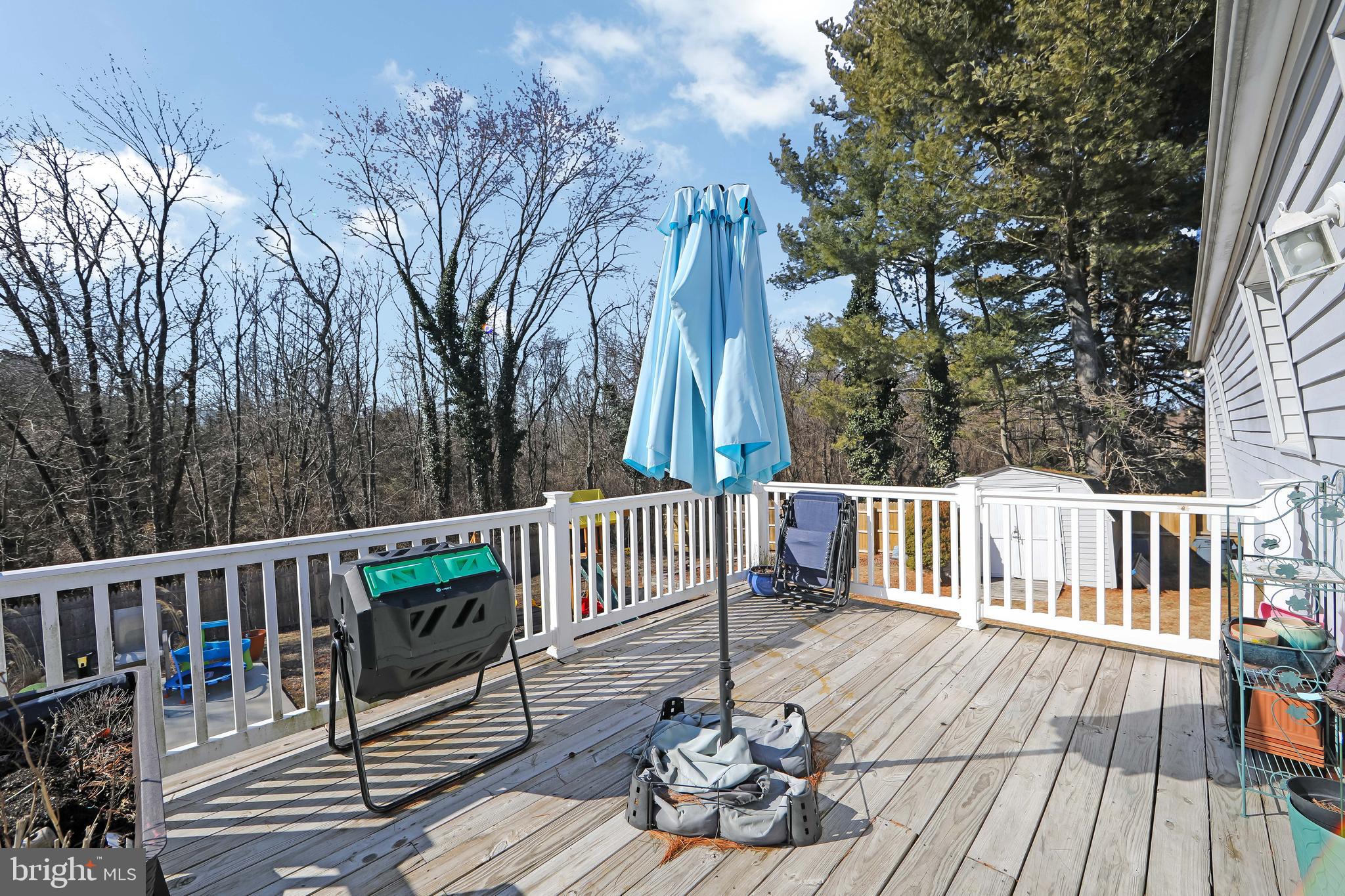 121 Capella Road Sewell, NJ 08080 - Photo 24 of 29 a view of a wooden deck with furniture