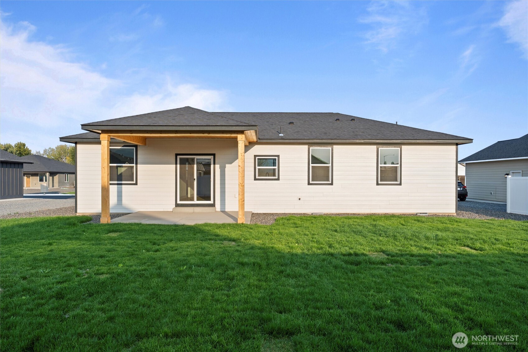 2391 Hunters Street Ephrata, WA 98823 - Photo 3 of 40 a front view of a house with yard