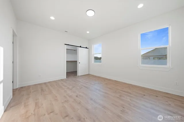 a view of an empty walk in closet
