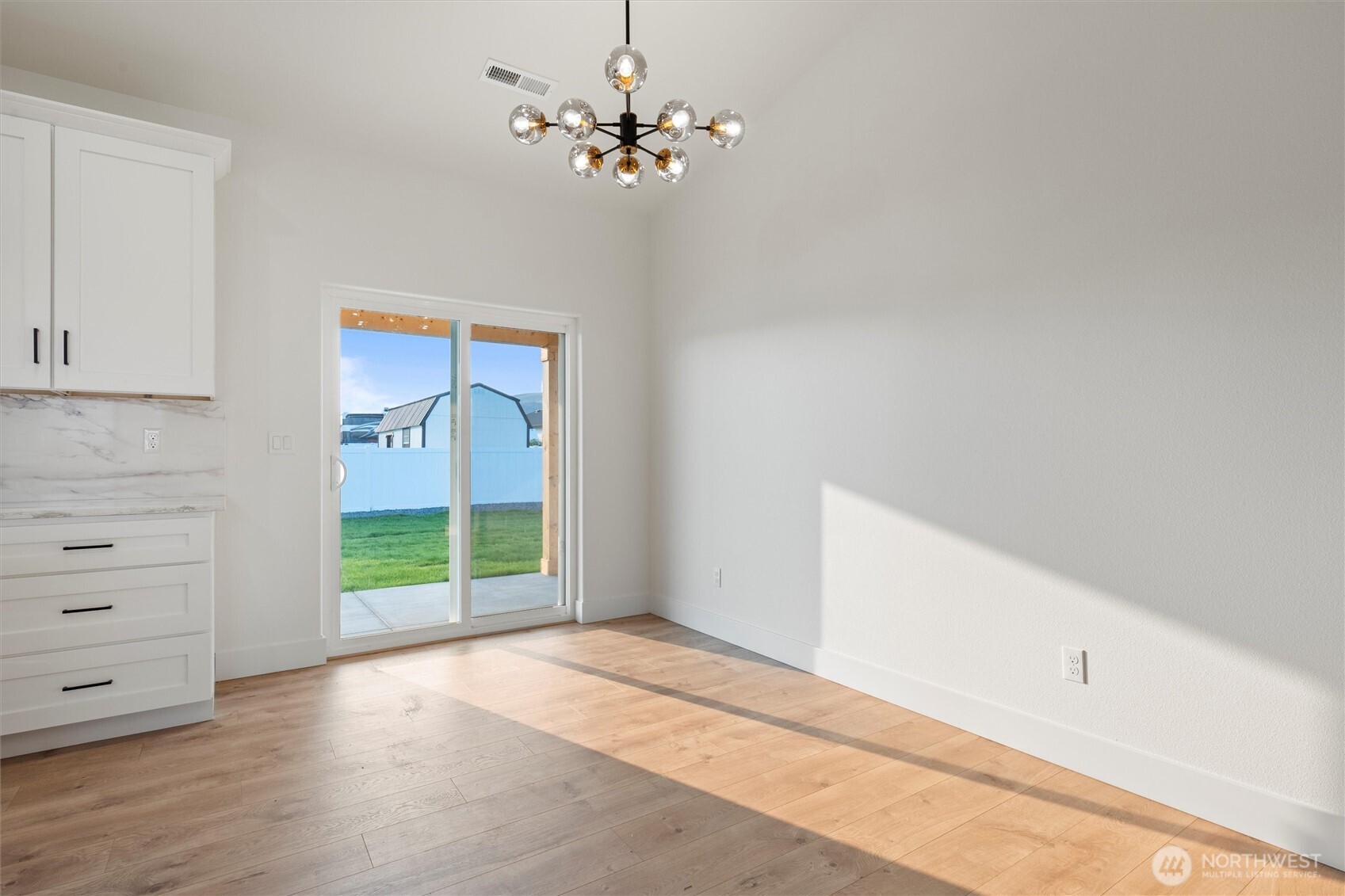 2391 Hunters Street Ephrata, WA 98823 - Photo 9 of 40 a view of an empty room with a window