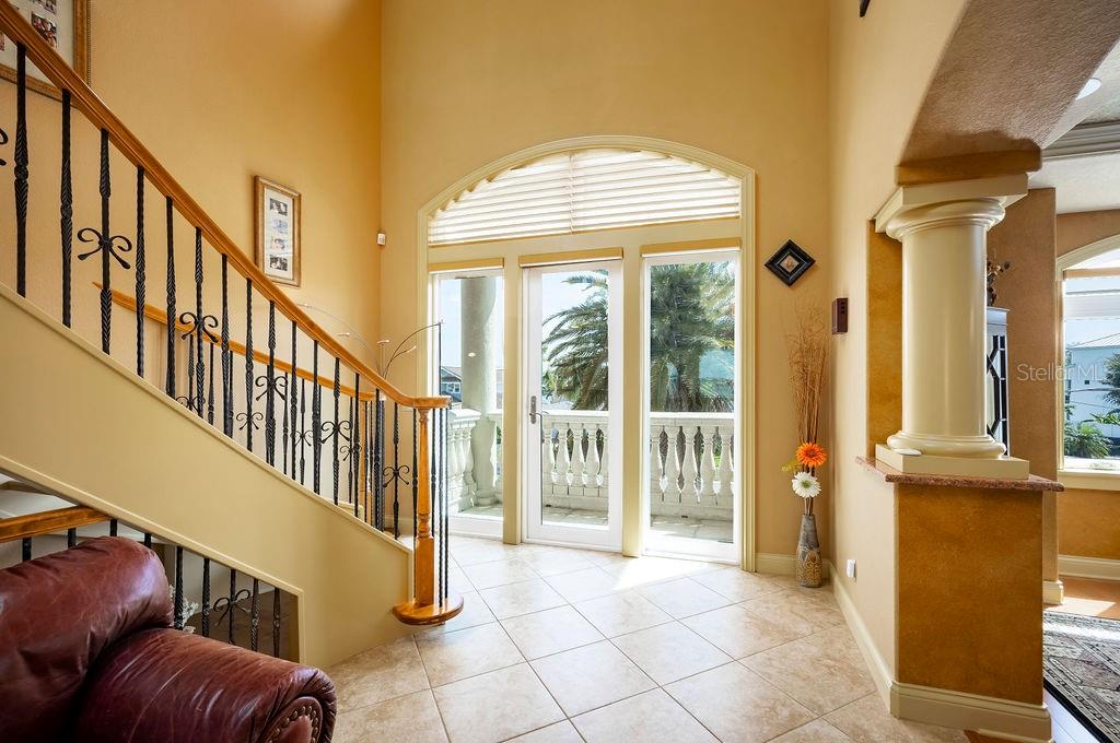 306 Harbor Drive Indian Rocks Beach, FL 33785 - Photo 11 of 49 a view of entryway with a front door