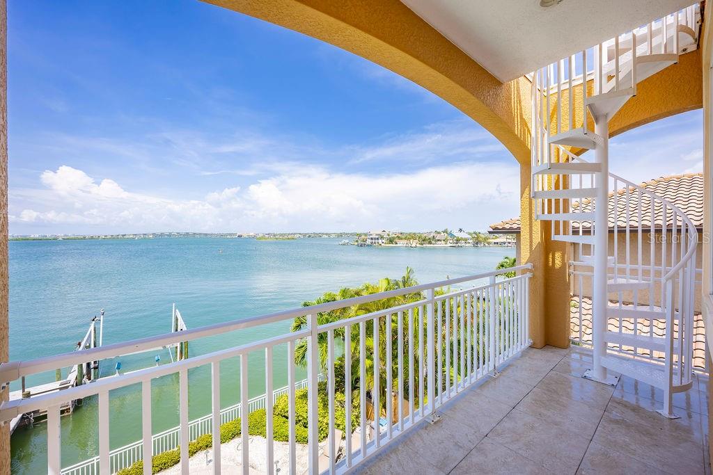 306 Harbor Drive Indian Rocks Beach, FL 33785 - Photo 26 of 49 a view of a balcony with lake view