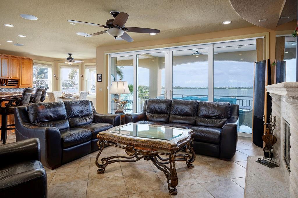 306 Harbor Drive Indian Rocks Beach, FL 33785 - Photo 5 of 49 a living room with furniture and a fireplace