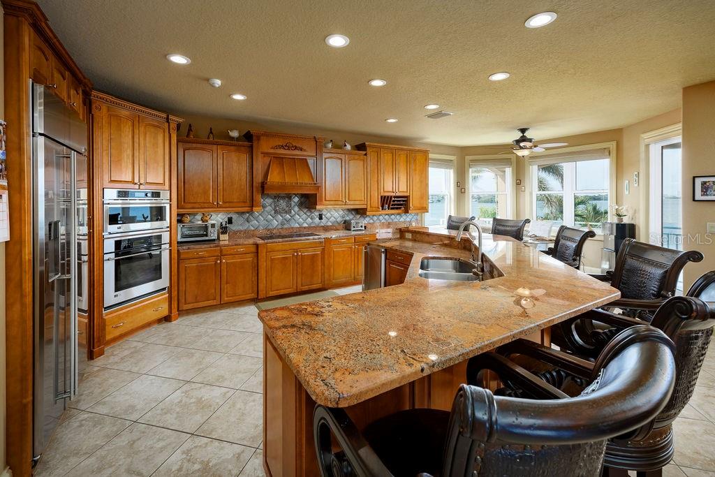 306 Harbor Drive Indian Rocks Beach, FL 33785 - Photo 6 of 49 a large kitchen with lots of counter top space
