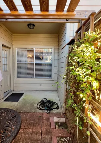 a house view with a backyard space