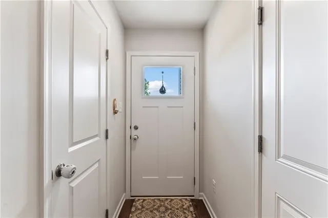 a bathroom with a glass door shower