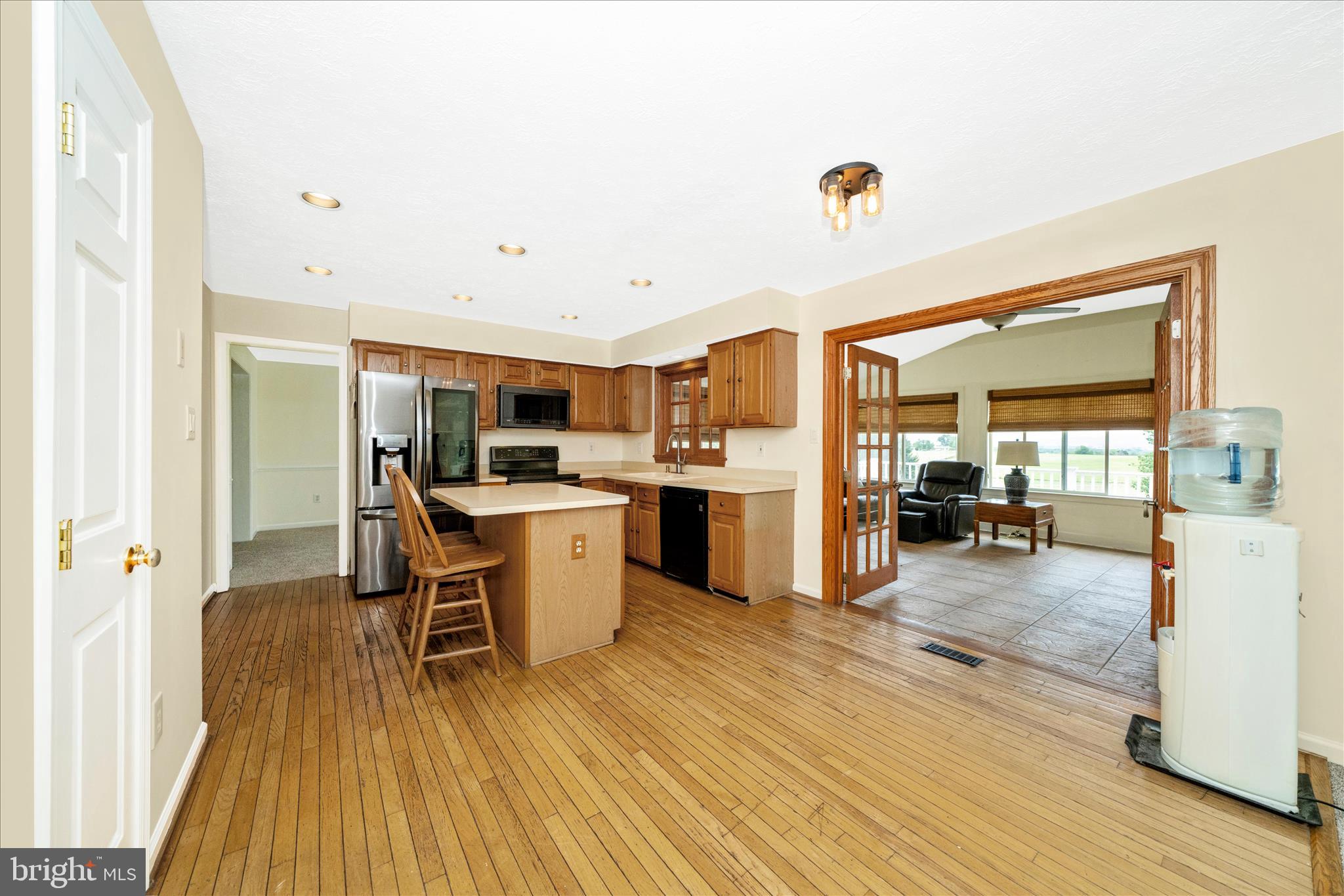 9534 Liberty Road Frederick, MD 21701 - Photo 21 of 70 a kitchen with a sink appliances and wooden floor