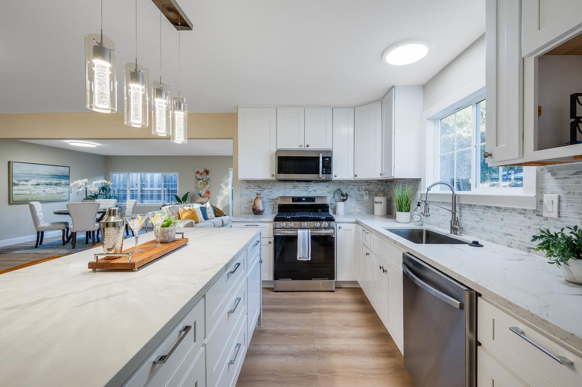 3173 Shuler Circle Marina, CA 93933 - Photo 22 of 55 a kitchen with a sink cabinets and appliances