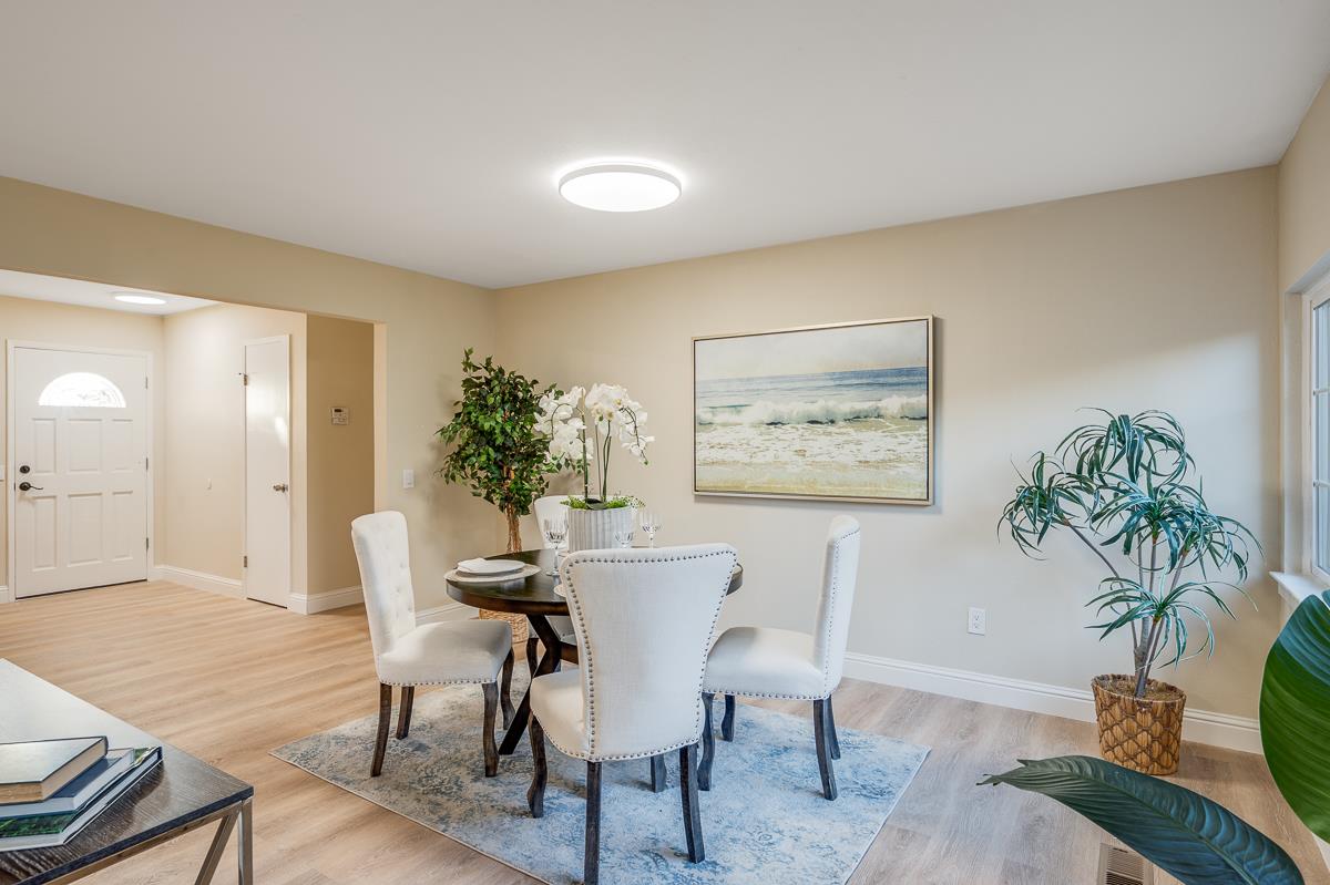 3173 Shuler Circle Marina, CA 93933 - Photo 30 of 55 a view of a dining room with furniture and a potted plant